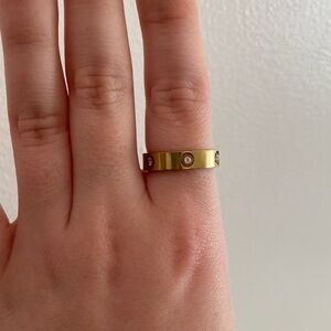 Gold ring with studs